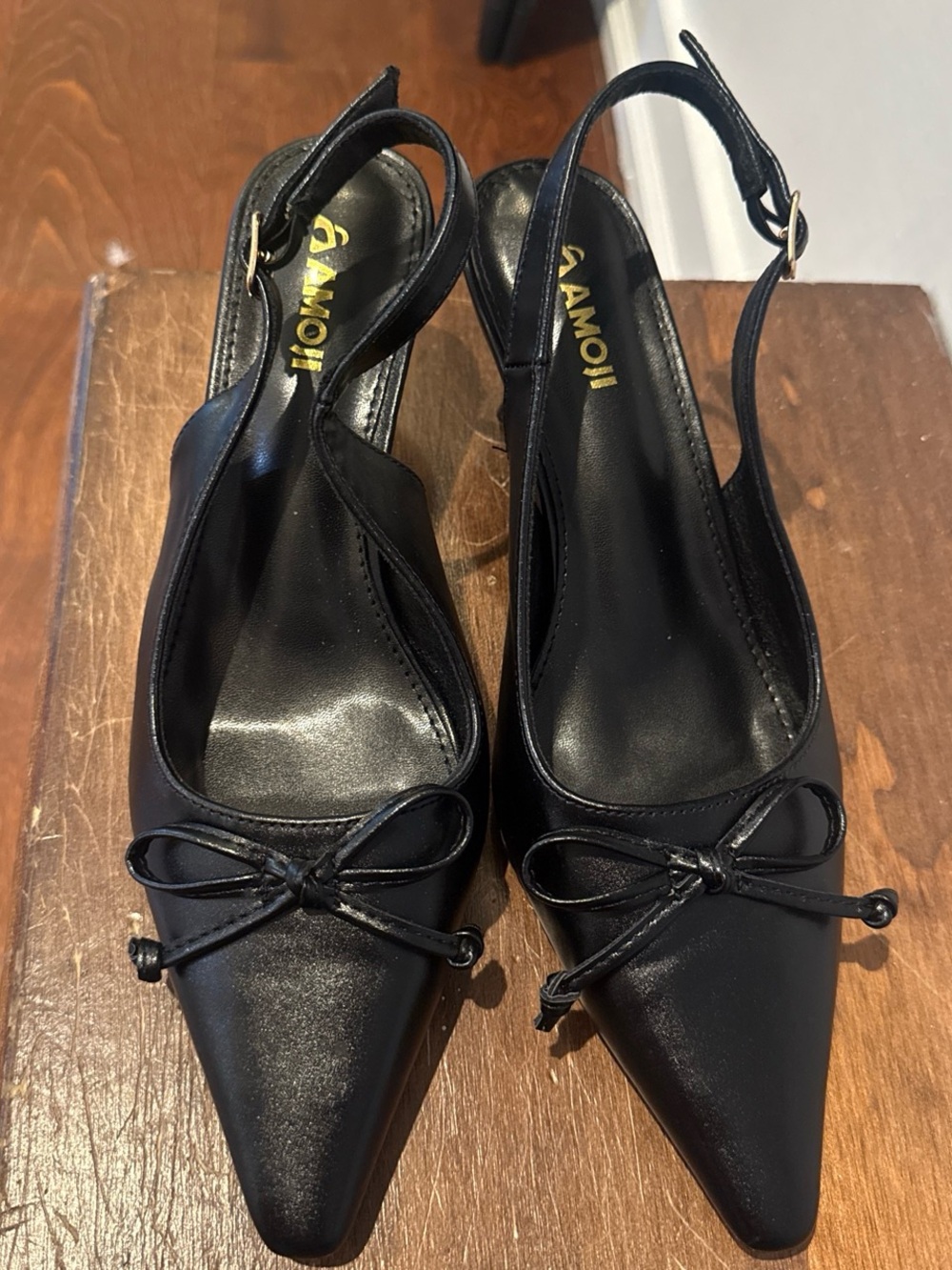AMO Black Pointed Slingback Mules with Bow Detail